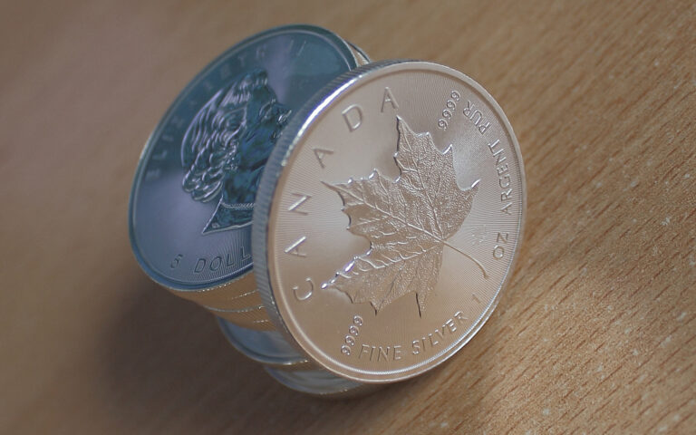 Silver Falls Below $57 as December Fed Hike Odds Hit 90%